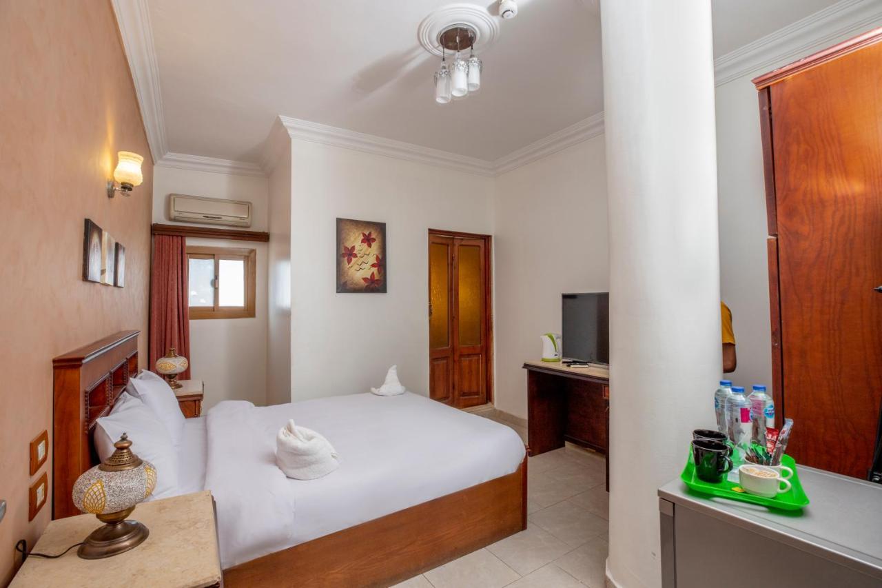 Pyramids Inn Hotel Kafret el-Gabal Extérieur photo