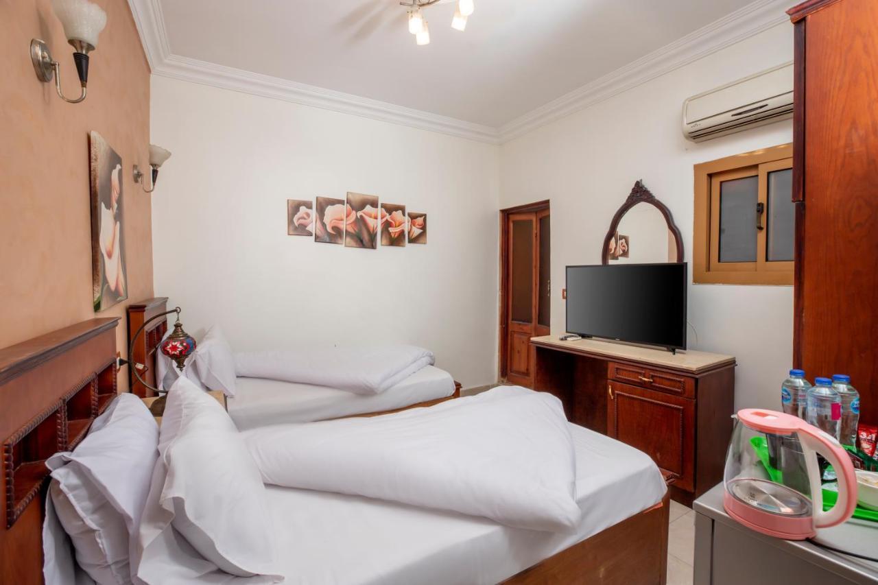 Pyramids Inn Hotel Kafret el-Gabal Extérieur photo